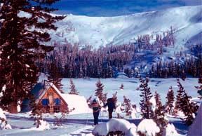 Image of Peter Grubb Hut and skiers